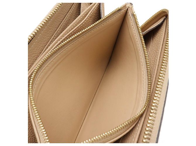 Portafoglio Zippy Monogram Empreinte Louis Vuitton Marrone Beige - vista 7
