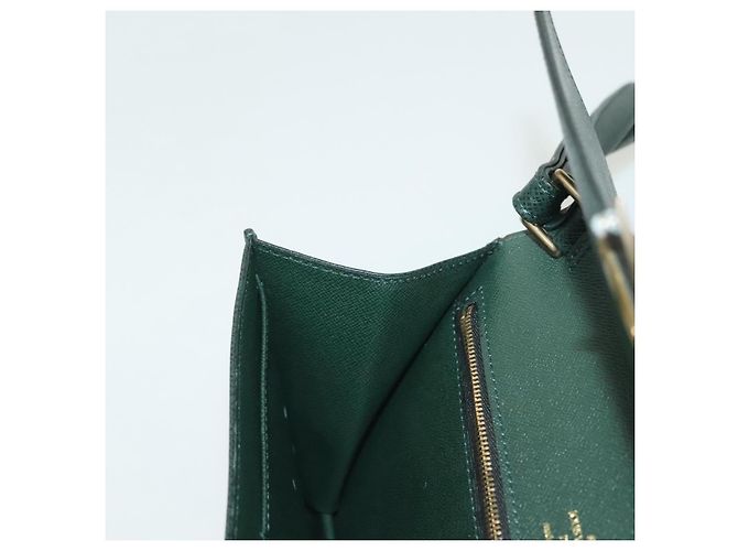 LOUIS VUITTON Pochette Kourad in Taiga Borsa Clutch Épicea M30194 LV Auth th6278 - vista 20