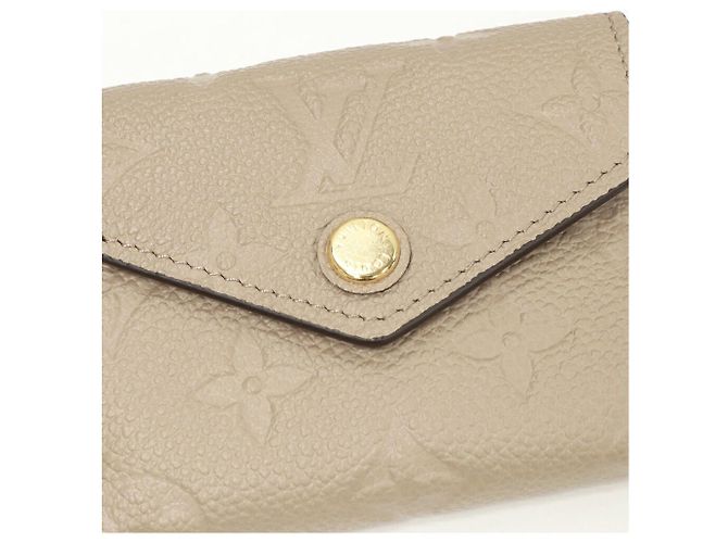 Cartera Compacta Zoe Monograma Empreinte Louis Vuitton M69800 Beige - vista 6