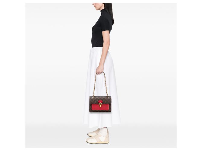 Louis Vuitton Victoire Monograma Marrom - vista 9