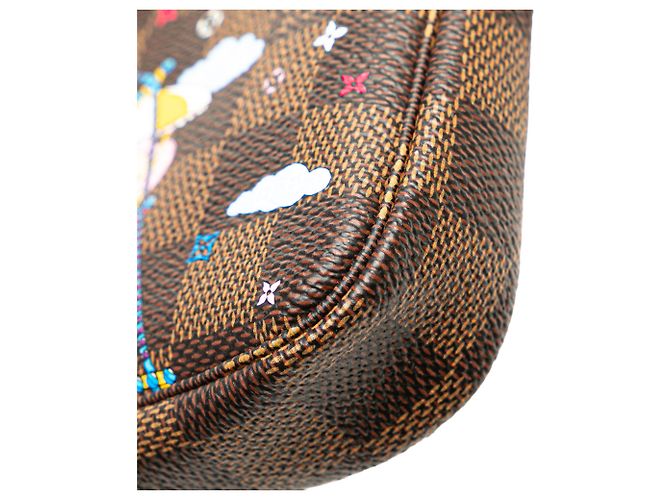 Mini Pochette Accessoires Vivienne Holiday Damier Ebene Marrone Louis Vuitton - vista 7