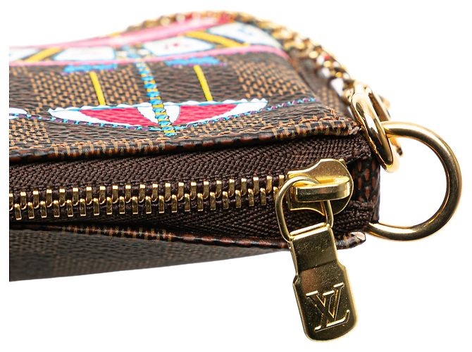 Mini Pochette Accessoires Vivienne Holiday Damier Ebene Marrone Louis Vuitton - vista 9