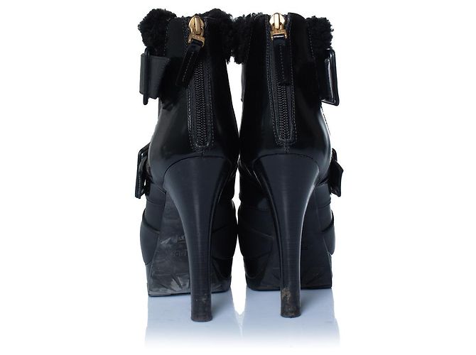 Fendi, botines de cuero negro con shearling - vista 6
