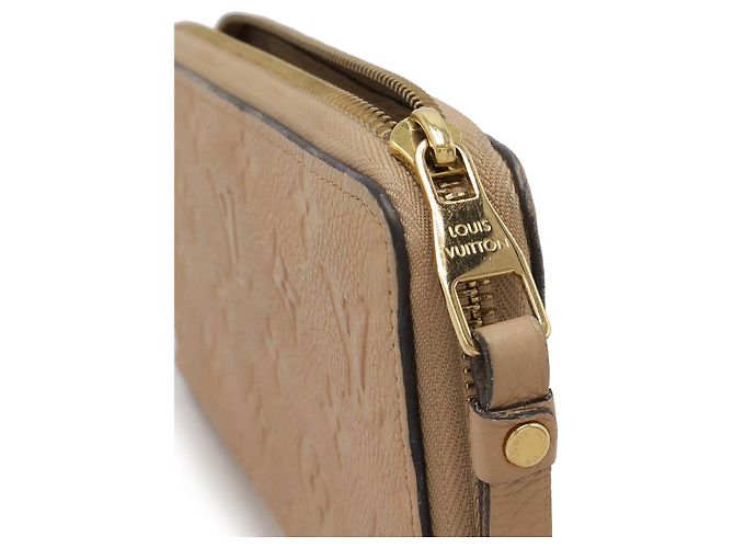 Portafoglio Lungo Zippy Monogram Empreinte Louis Vuitton M60746 Marrone Beige - vista 4