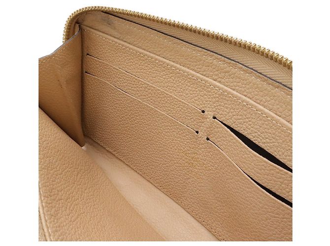 Portafoglio Lungo Zippy Monogram Empreinte Louis Vuitton M60746 Marrone Beige - vista 8