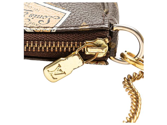 Mini Pochette Accessoires Monogramma Marrone Louis Vuitton - vista 8