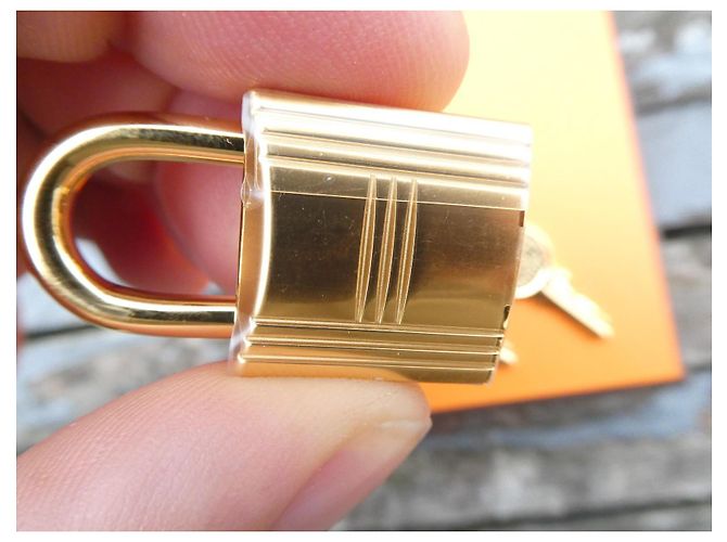 nuovo lucchetto in acciaio dorato Hermès per borse Hermès Birkin, Kelly, ecc... Gold hardware - vista 3