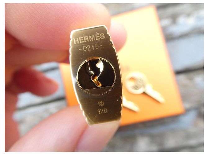 nuovo lucchetto in acciaio dorato Hermès per borse Hermès Birkin, Kelly, ecc... Gold hardware - vista 4