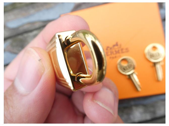 nuovo lucchetto Hermès dorato per borse Hermès Kelly, Birkin, ecc... Gold hardware - vista 6