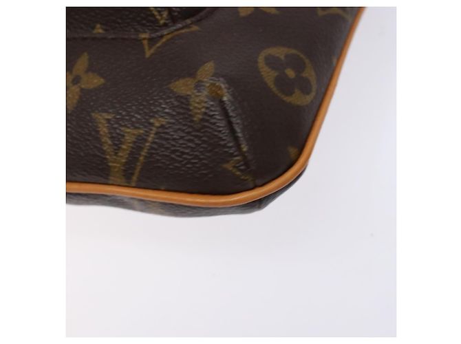 Clutch da polso Partition Louis Vuitton in tela Monogram Marrone - vista 7