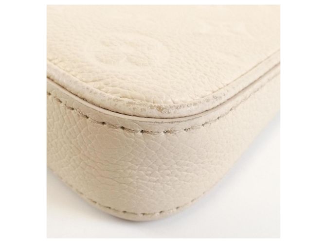 Pochette Easy Monogram Empreinte M81066 di Louis Vuitton Crudo - vista 3
