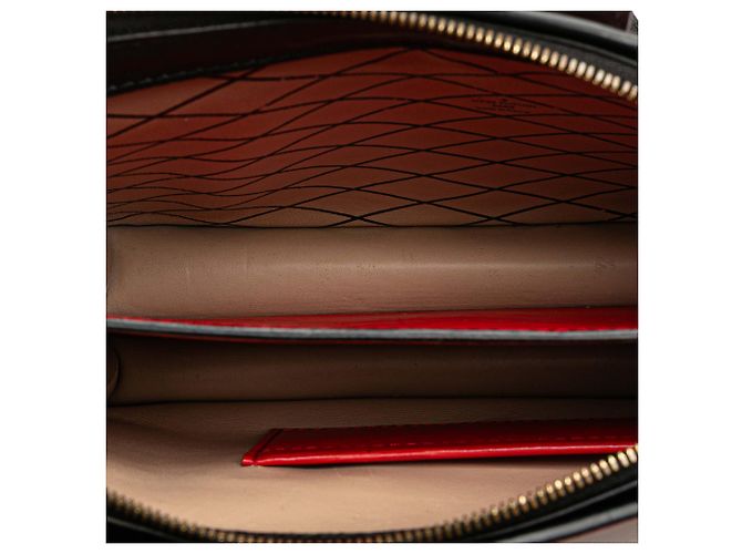 Clutch Trunk Epi Rosso Louis Vuitton - vista 4