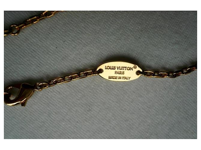 Louis Vuitton COLLANA V per Vuitton TBE M02268 Gold hardware - vista 5
