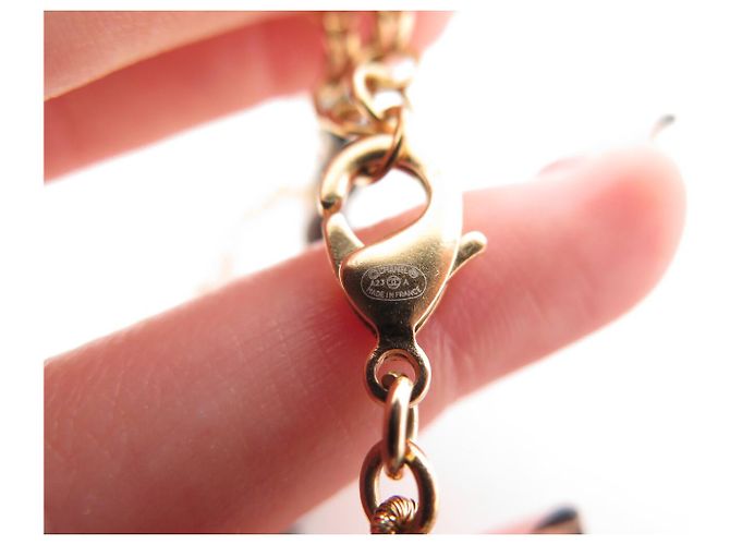 NUOVO COLLIER CHOKER CHANEL LOGO CC CON STRASS E PERLE NERE IN LEGNO D'oro - vista 4