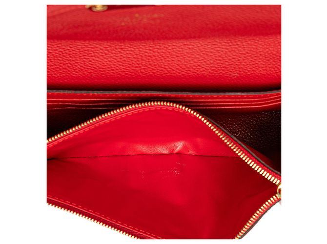 Pochette Saint Germain in Monogram Empreinte Rosso di Louis Vuitton - vista 4