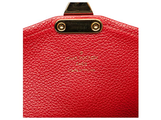 Pochette Saint Germain in Monogram Empreinte Rosso di Louis Vuitton - vista 6
