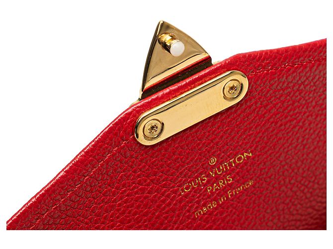Pochette Saint Germain in Monogram Empreinte Rosso di Louis Vuitton - vista 9