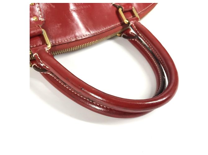 Borsa Tote Louis Vuitton Suhali Lockit MM in Rosso Tanami - vista 11