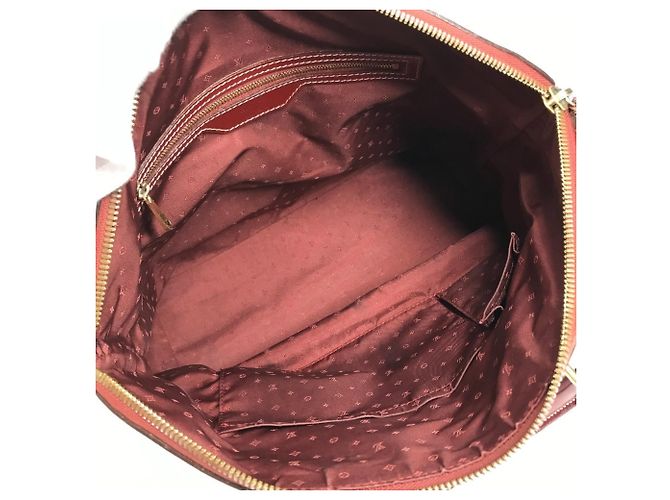 Borsa Tote Louis Vuitton Suhali Lockit MM in Rosso Tanami - vista 13
