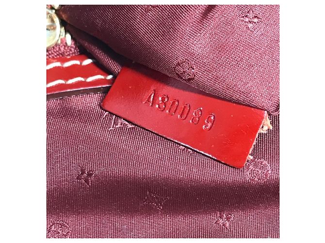 Borsa Tote Louis Vuitton Suhali Lockit MM in Rosso Tanami - vista 14