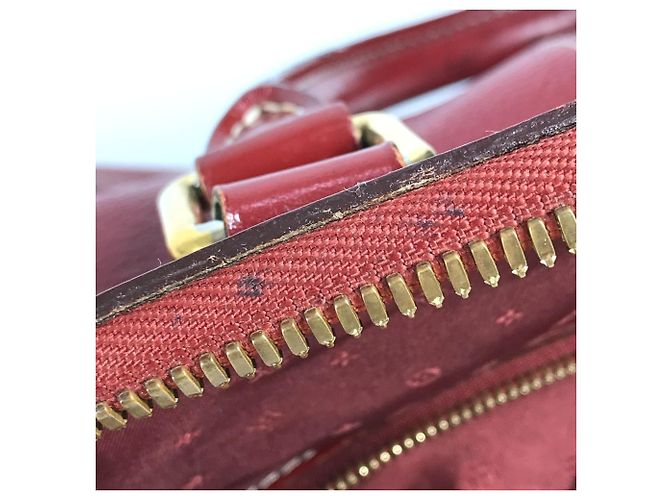 Borsa Tote Louis Vuitton Suhali Lockit MM in Rosso Tanami - vista 15