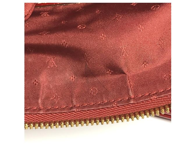 Borsa Tote Louis Vuitton Suhali Lockit MM in Rosso Tanami - vista 16