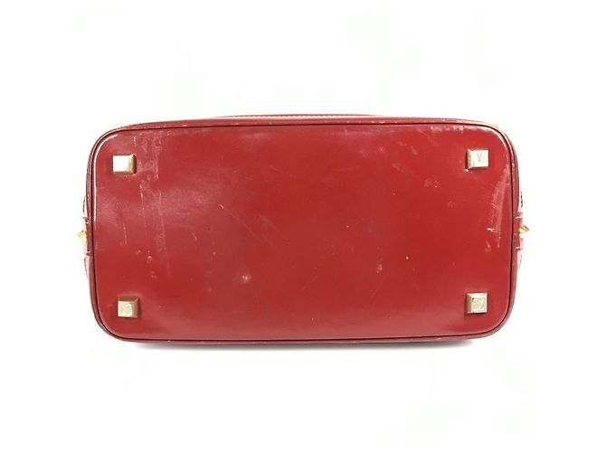 Borsa Tote Louis Vuitton Suhali Lockit MM in Rosso Tanami - vista 5