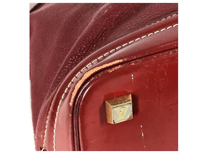 Borsa Tote Louis Vuitton Suhali Lockit MM in Rosso Tanami - vista 6