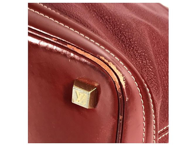 Borsa Tote Louis Vuitton Suhali Lockit MM in Rosso Tanami - vista 7
