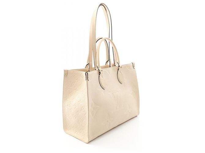 Borsa tote Louis Vuitton OnTheGo MM in pelle Monogram Empreinte Bianco Crudo - vista 2
