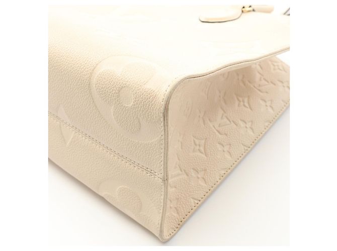 Borsa tote Louis Vuitton OnTheGo MM in pelle Monogram Empreinte Bianco Crudo - vista 6
