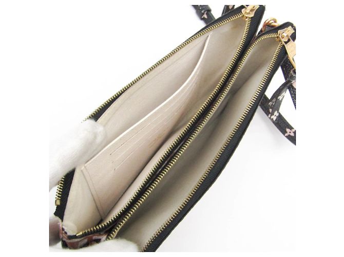 Pochette Doppia Zip Clafity LV M69488 di Louis Vuitton Marrone Nero Bianco - vista 3