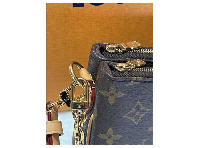 Pochette Louis Vuitton Liv in pelle marrone scuro - vista 4