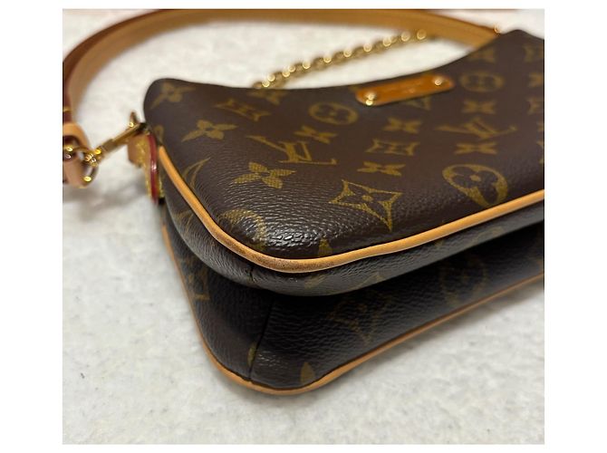 Pochette Louis Vuitton Liv in pelle marrone scuro - vista 6
