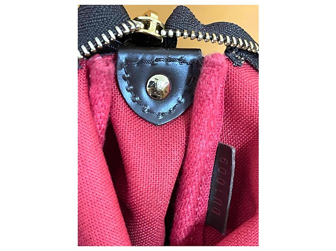 Clutch Louis Vuitton Eva in pelle marrone - vista 16