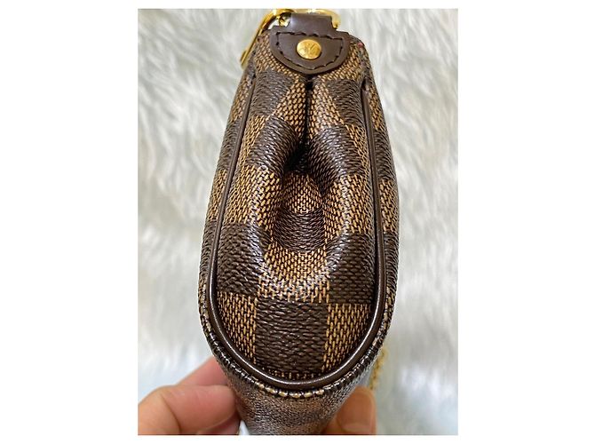 Clutch Louis Vuitton Eva in pelle marrone - vista 3