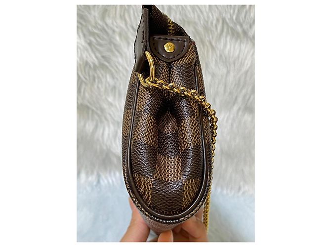 Clutch Louis Vuitton Eva in pelle marrone - vista 4