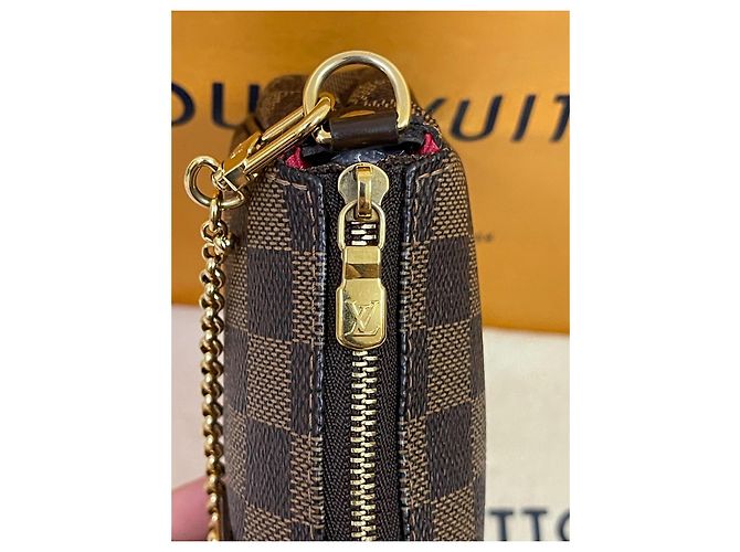 Clutch Louis Vuitton Eva in pelle marrone - vista 7