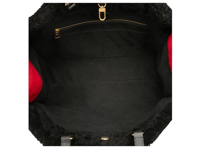 Louis Vuitton Borsa Onthego GM in shearling gigante monogramma nero - vista 4