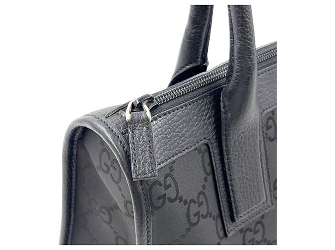 Bolsa de mão em couro e lona preta com padrão GG da GUCCI - vista 6