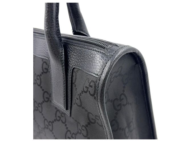 Bolsa de mão em couro e lona preta com padrão GG da GUCCI - vista 7