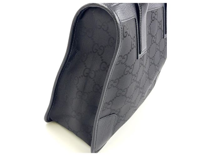 Bolsa de mão em couro e lona preta com padrão GG da GUCCI - vista 9