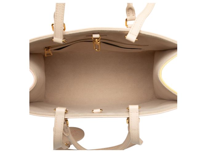 Borsa Onthego MM in Monogram Empreinte marrone di Louis Vuitton - Primavera in città Beige - vista 4