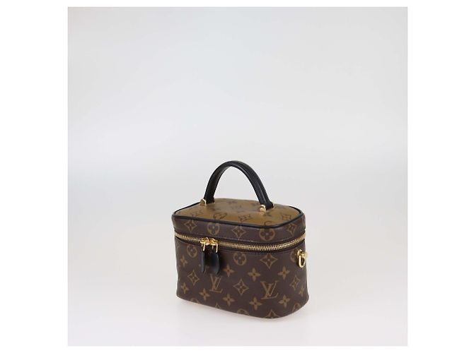 Beauty Case PM Monogram Reverse in Tela Louis Vuitton - vista 3