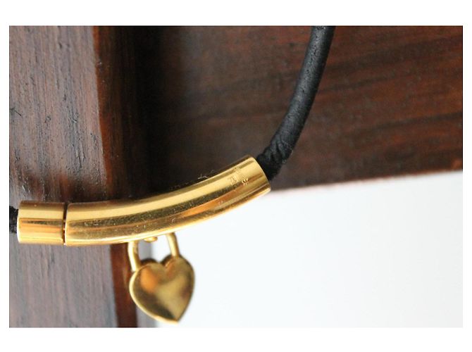 Collar con charm de corazón y candado Hermès en metal dorado Negro - vista 4