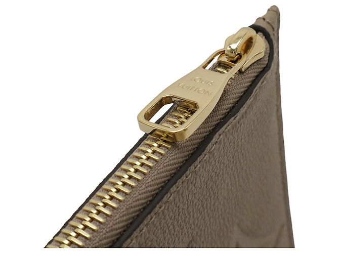 Pochette Monogram Empreinte Louis Vuitton Marrone - vista 4