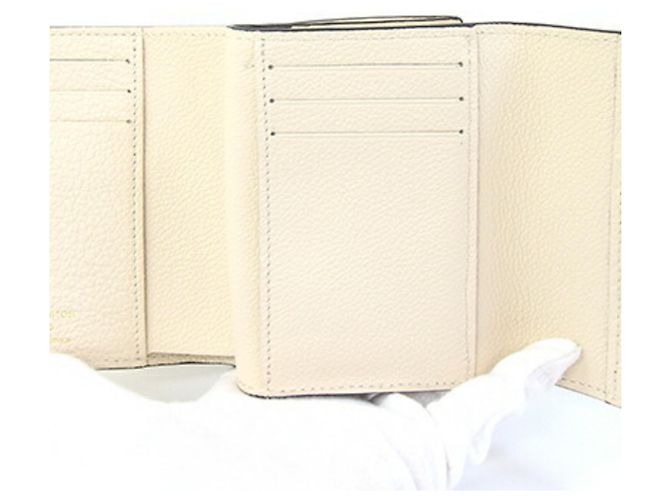Portafoglio Metis Compact Tri-fold in Monogram Empreinte Louis Vuitton Crudo - vista 4