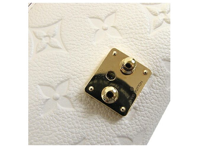 Portafoglio Metis Compact Tri-fold in Monogram Empreinte Louis Vuitton Crudo - vista 7