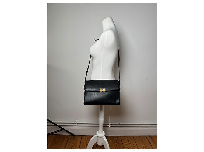 Vintage Givenchy Tasche aus schwarzem Leder mit Schlangenprägung - Ansicht 6