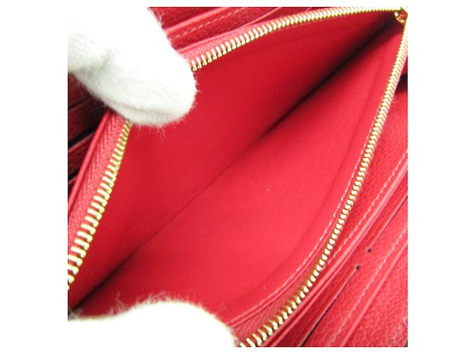 Cartera Zippy Monogram Empreinte Louis Vuitton M63691 Roja - vista 4